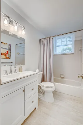 a blue chair sitting in front of a house