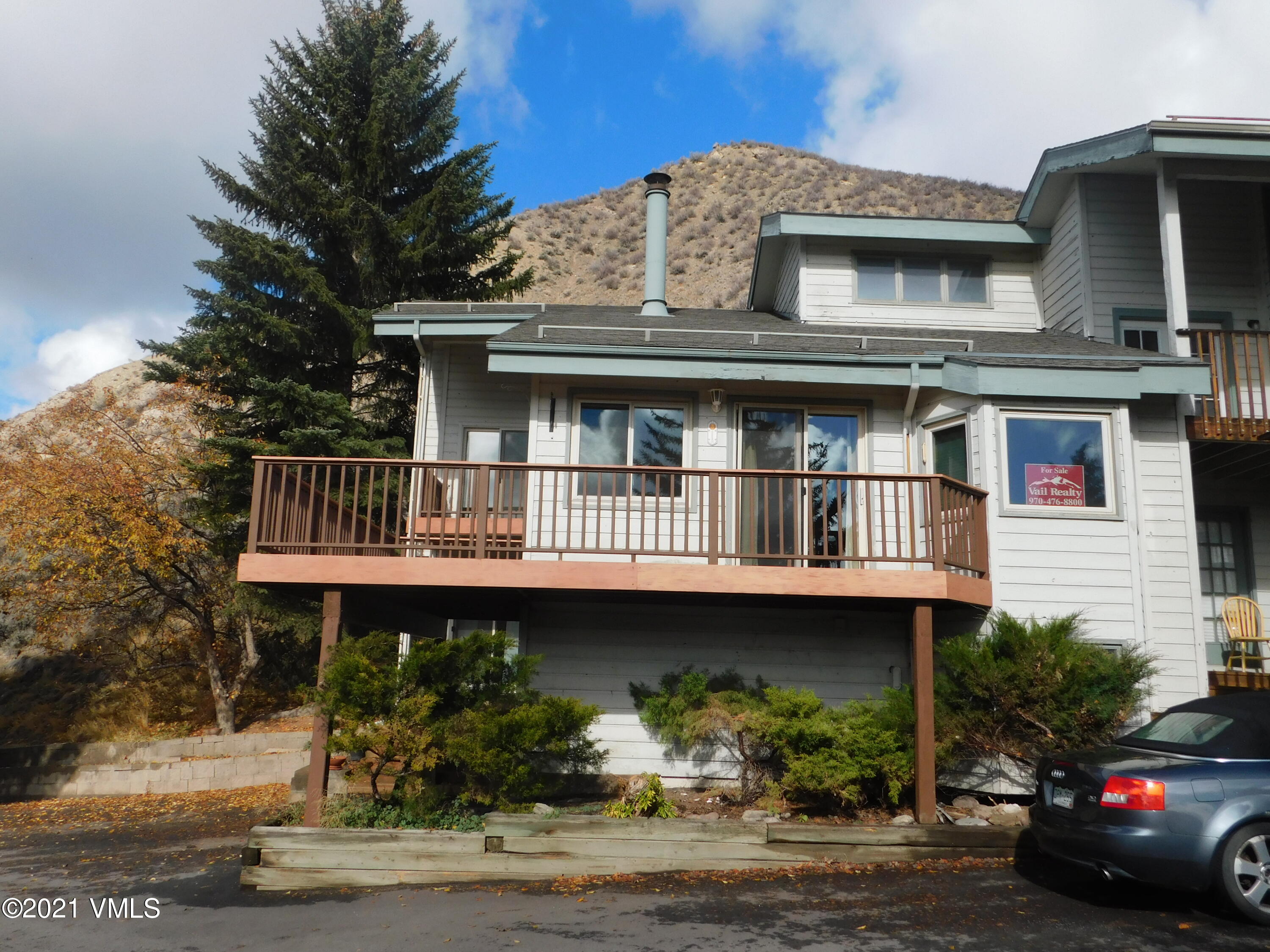 230 Nottingham Road, Unit A Avon, CO 81620 - Photo 1 of 12 a view of a house with a balcony