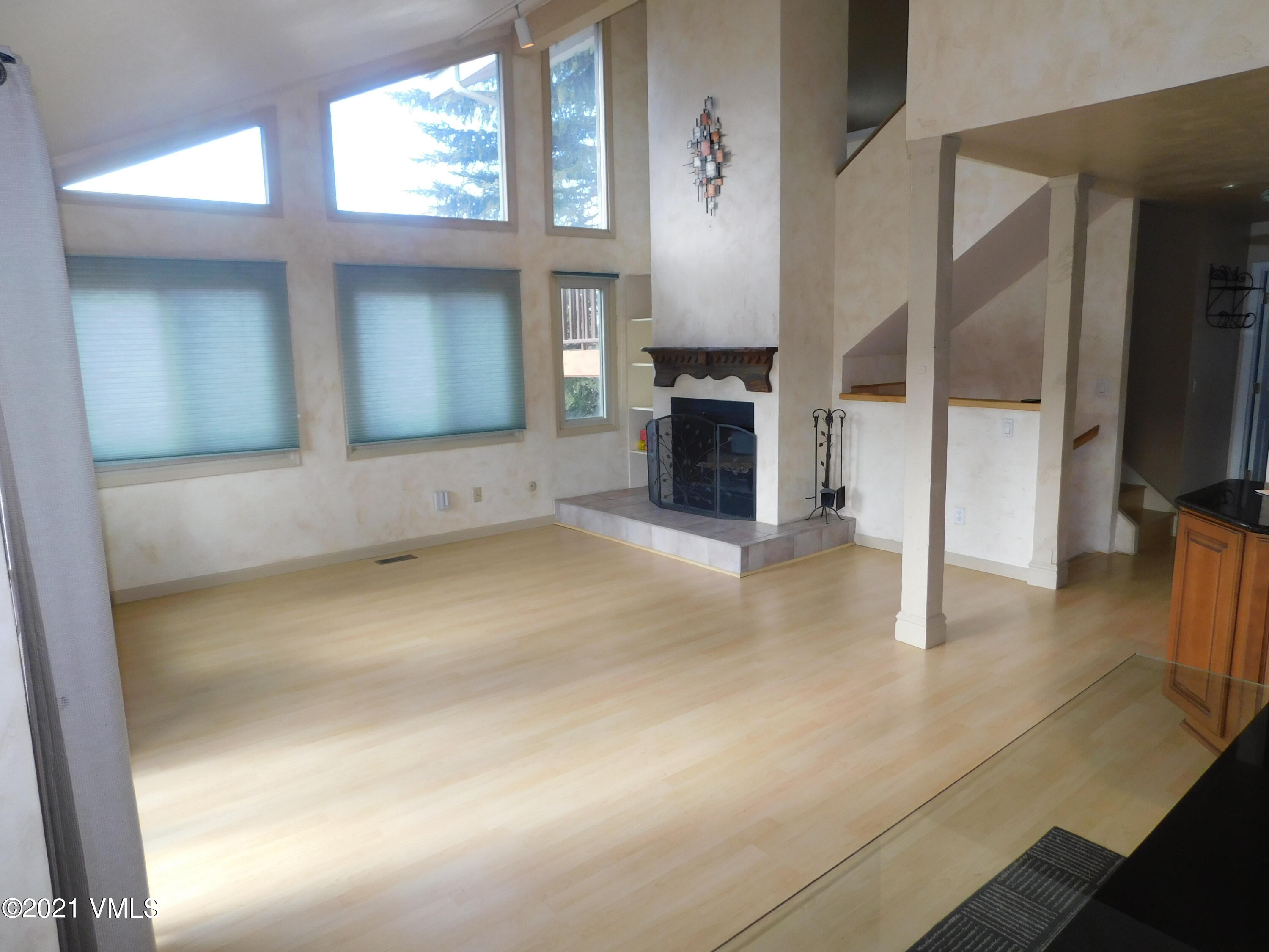 230 Nottingham Road, Unit A Avon, CO 81620 - Photo 4 of 12 a view of a livingroom with a fireplace