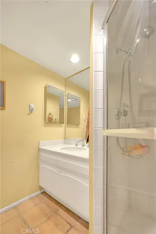 a bed room with a bed and a window