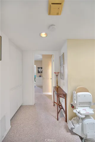 a bathroom with a mirror a sink and a vanity
