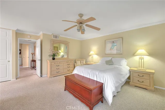 a spacious bathroom with a double vanity sink a mirror and a bathtub