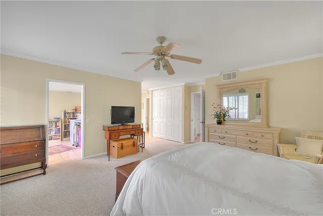 a spacious bathroom with a sink a mirror and a shower