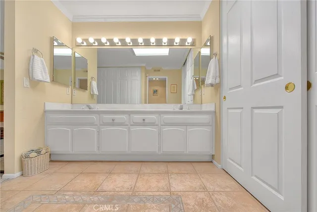 a bedroom with a bed and a table