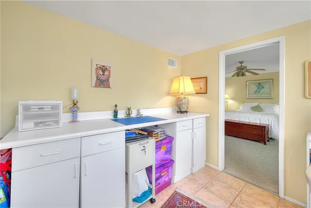 a bathroom with a double vanity sink mirror and bathtub