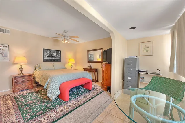 a view of a patio with a table and chairs