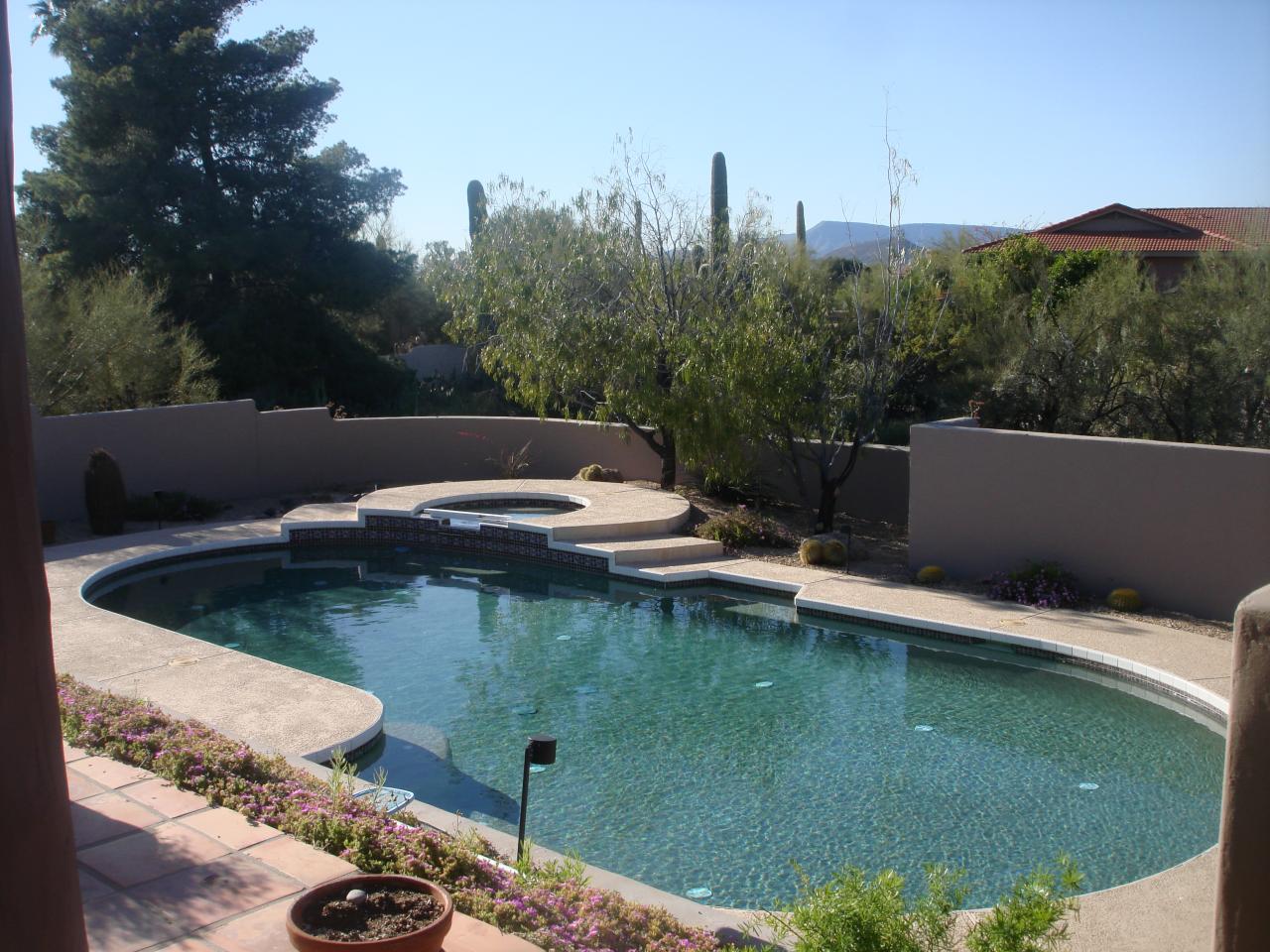 9432 Romping Road Carefree, AZ 85377 - Photo 7 of 18 Pool and spa view from kitchen patio