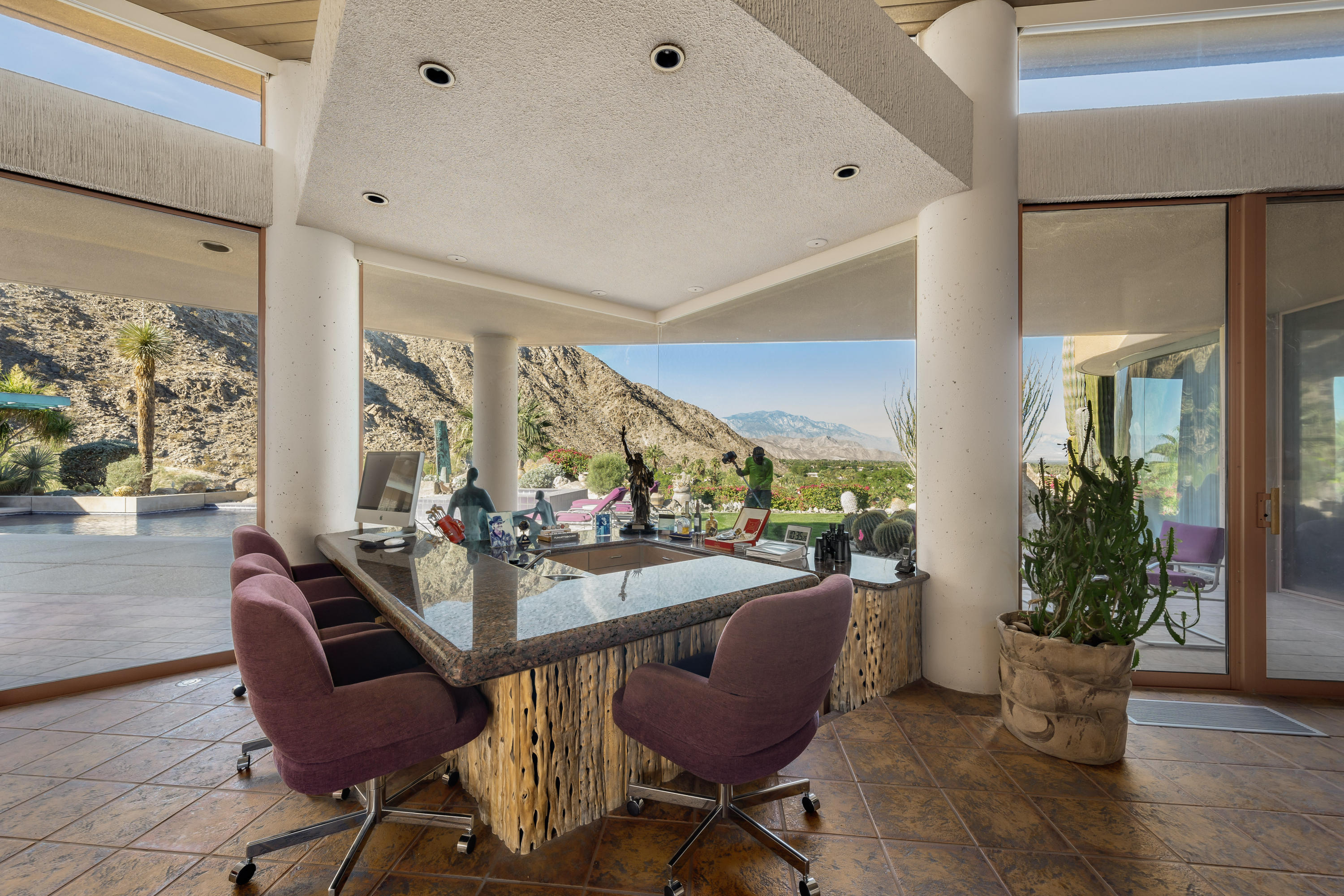 75270 Hidden Cove Indian Wells, CA 92210 - Photo 13 of 73 a view of a dining room with furniture and a potted plant
