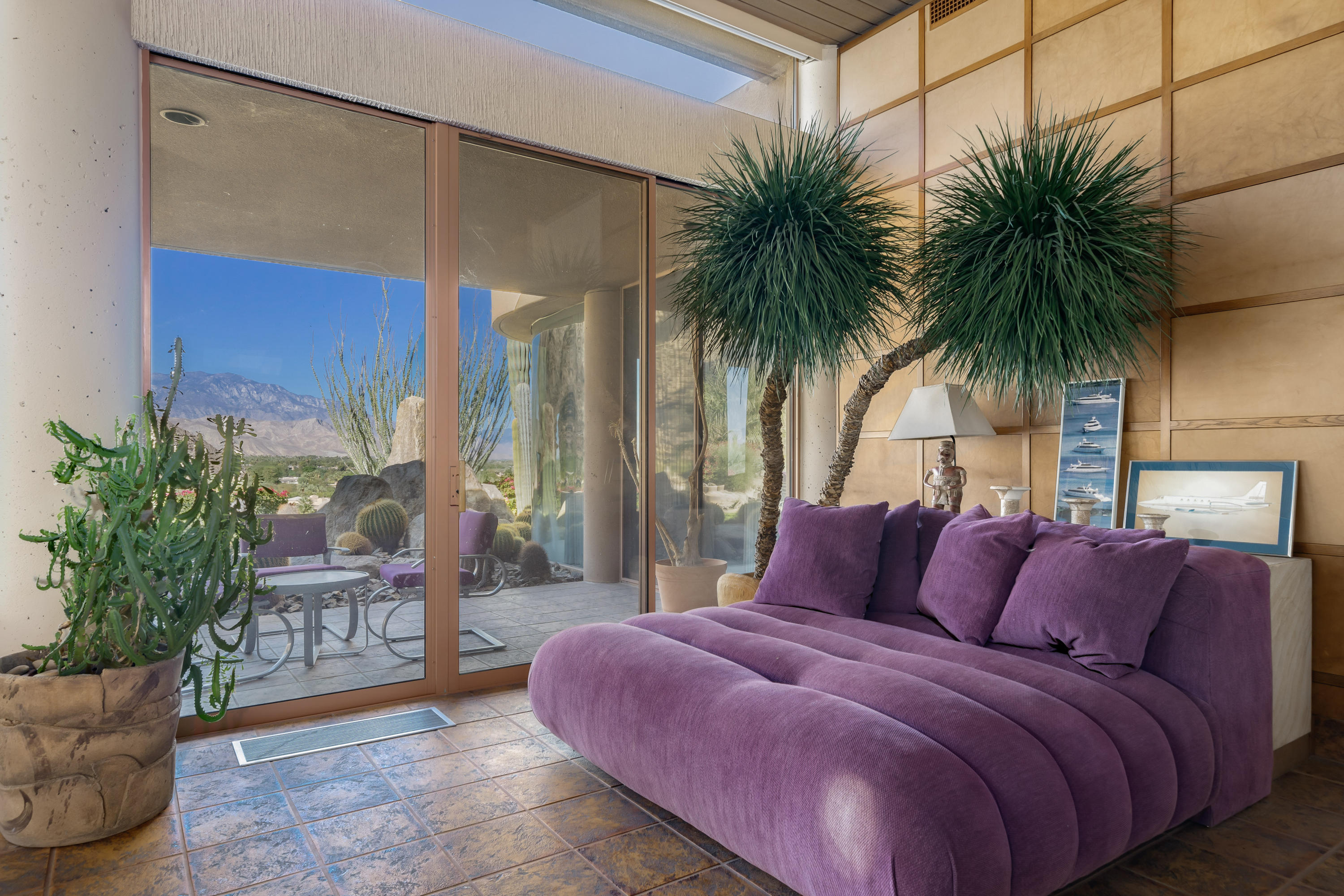 75270 Hidden Cove Indian Wells, CA 92210 - Photo 14 of 73 a bedroom with a large bed and a potted plant