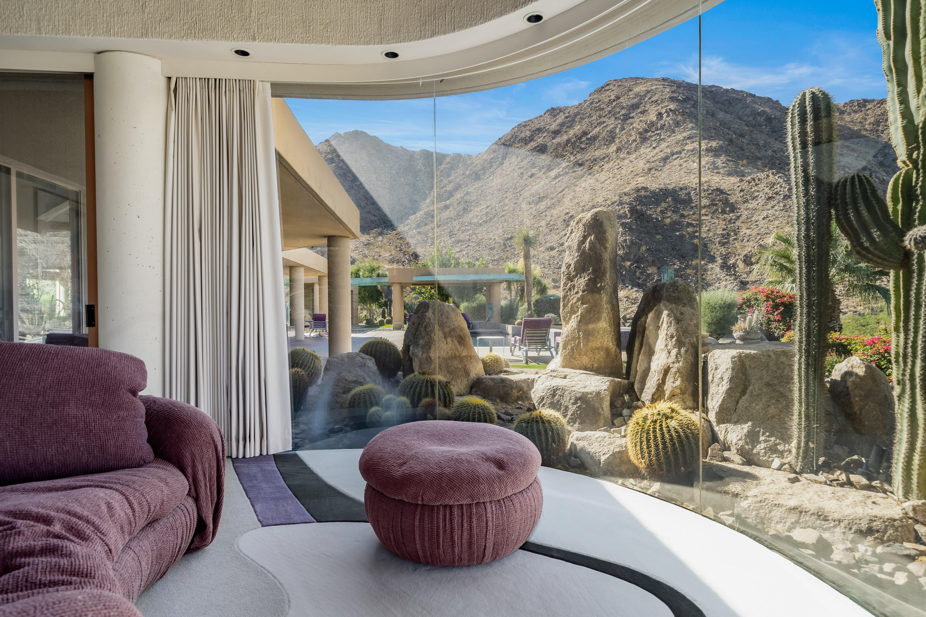 75270 Hidden Cove Indian Wells, CA 92210 - Photo 20 of 73 a living room with furniture and a fireplace