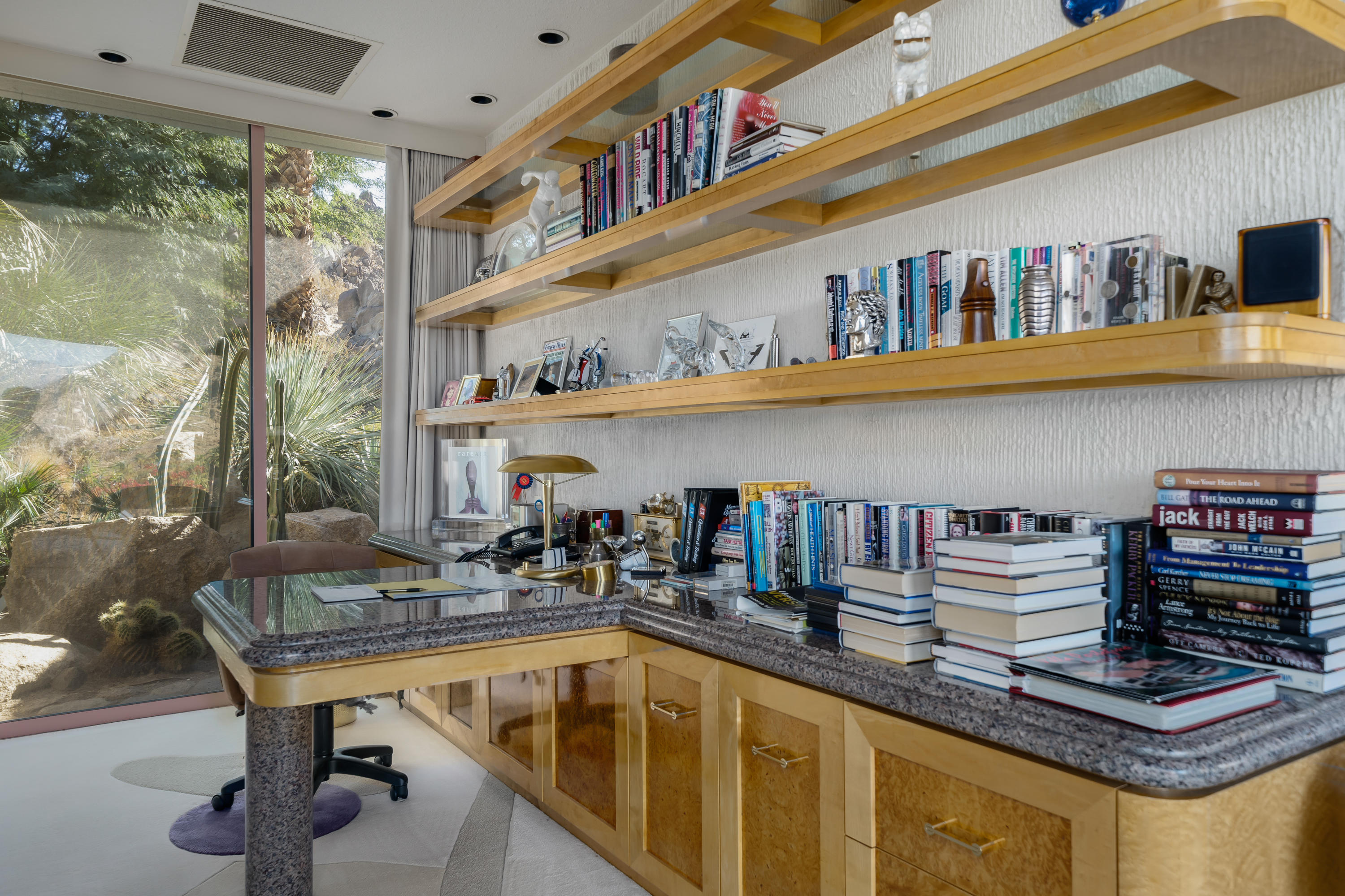 75270 Hidden Cove Indian Wells, CA 92210 - Photo 24 of 73 a kitchen with stainless steel appliances granite countertop a sink dishwasher and cabinets with wooden floor