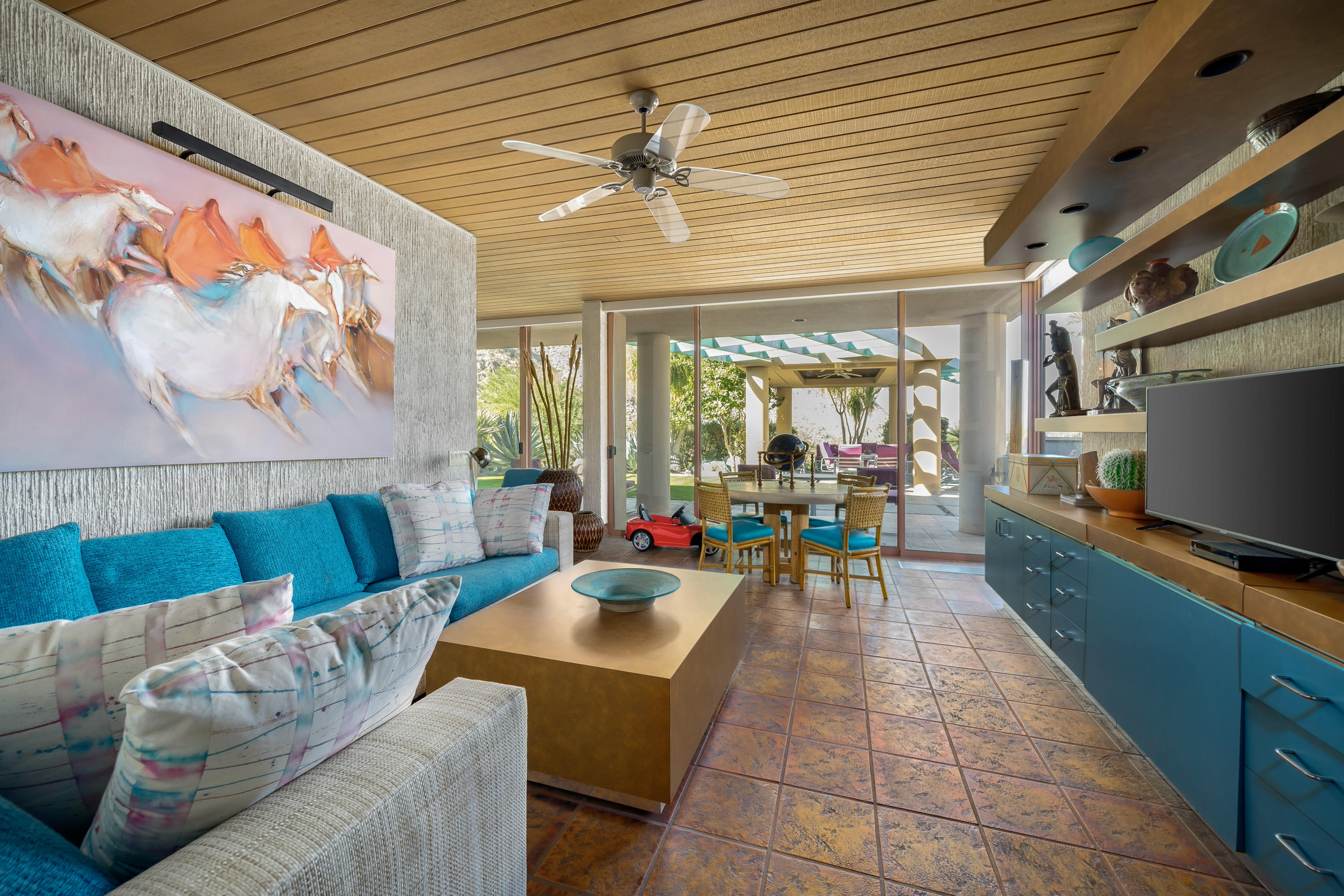 75270 Hidden Cove Indian Wells, CA 92210 - Photo 34 of 73 a living room with furniture and a flat screen tv