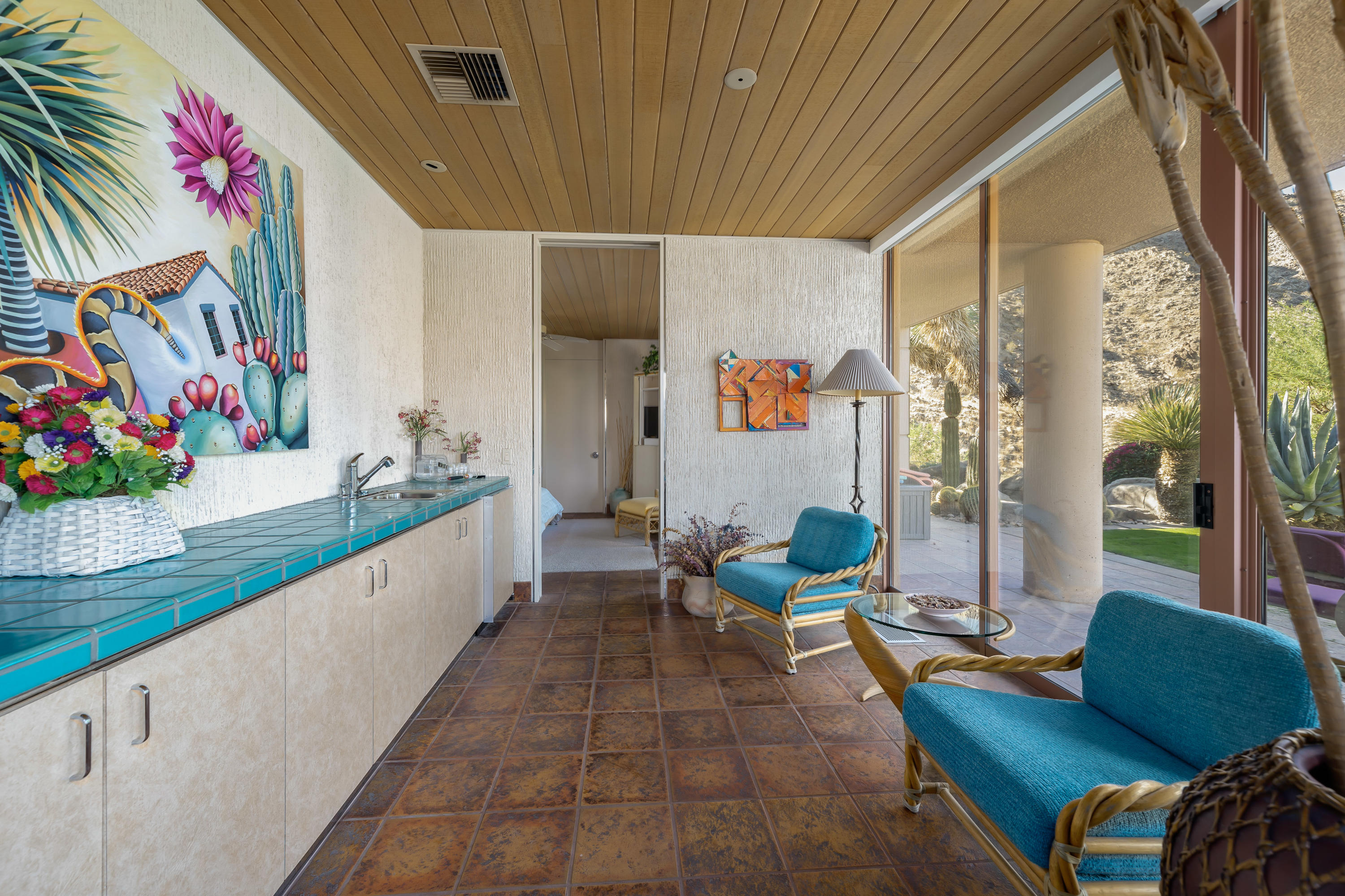 75270 Hidden Cove Indian Wells, CA 92210 - Photo 35 of 73 a living room with furniture and flowers