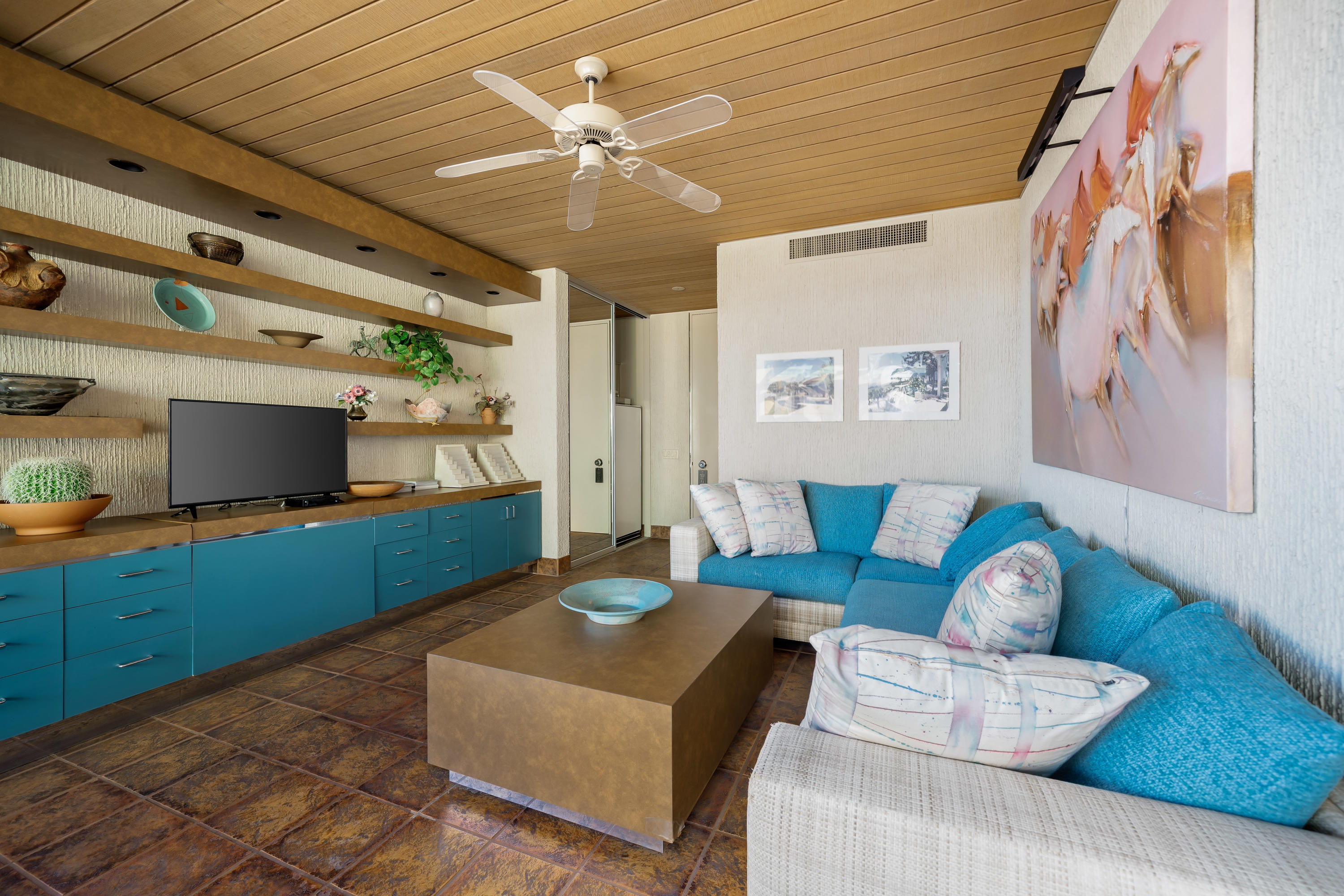75270 Hidden Cove Indian Wells, CA 92210 - Photo 36 of 73 a living room with furniture and a flat screen tv