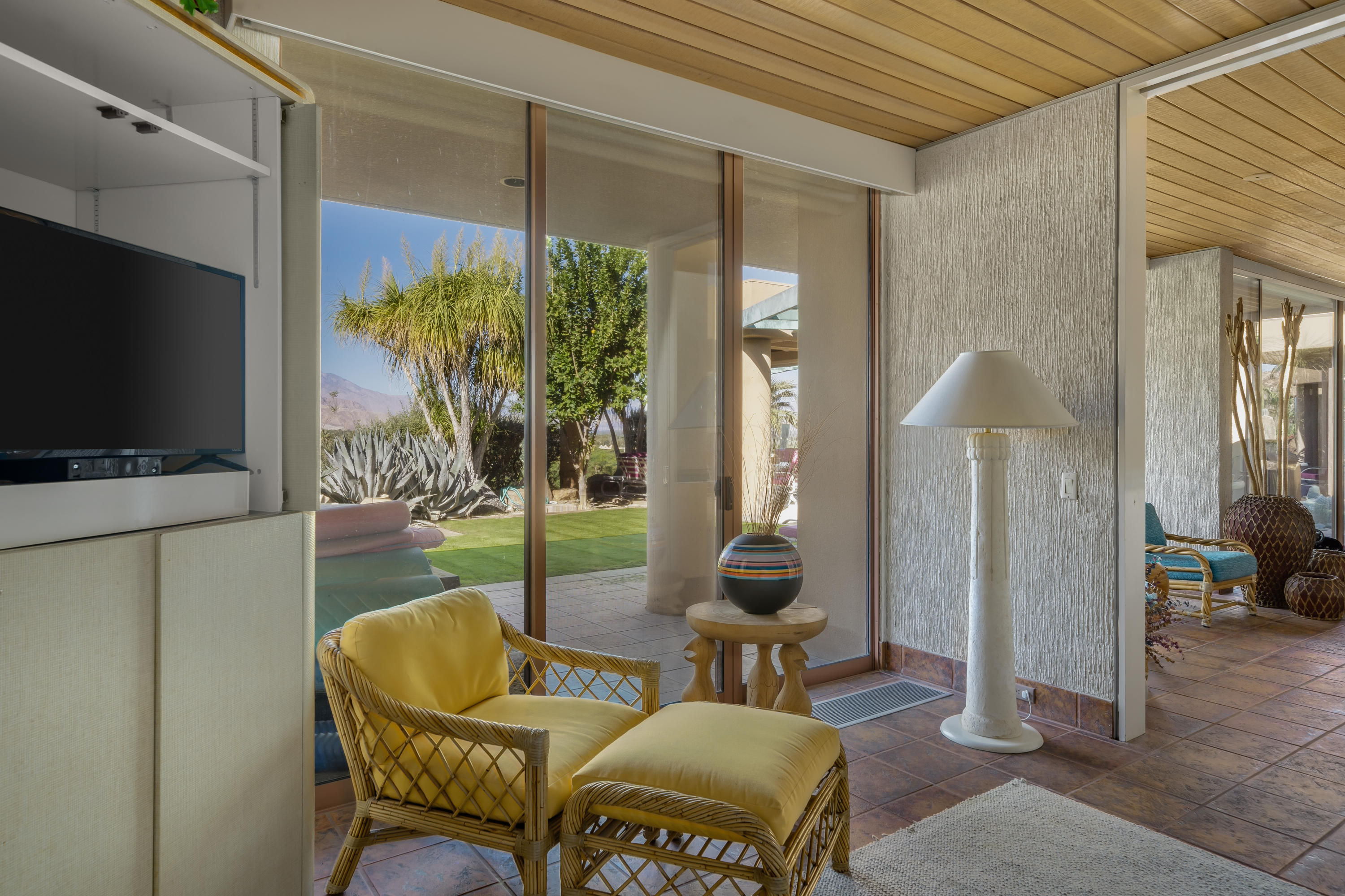 75270 Hidden Cove Indian Wells, CA 92210 - Photo 38 of 73 a living room with furniture and a flat screen tv