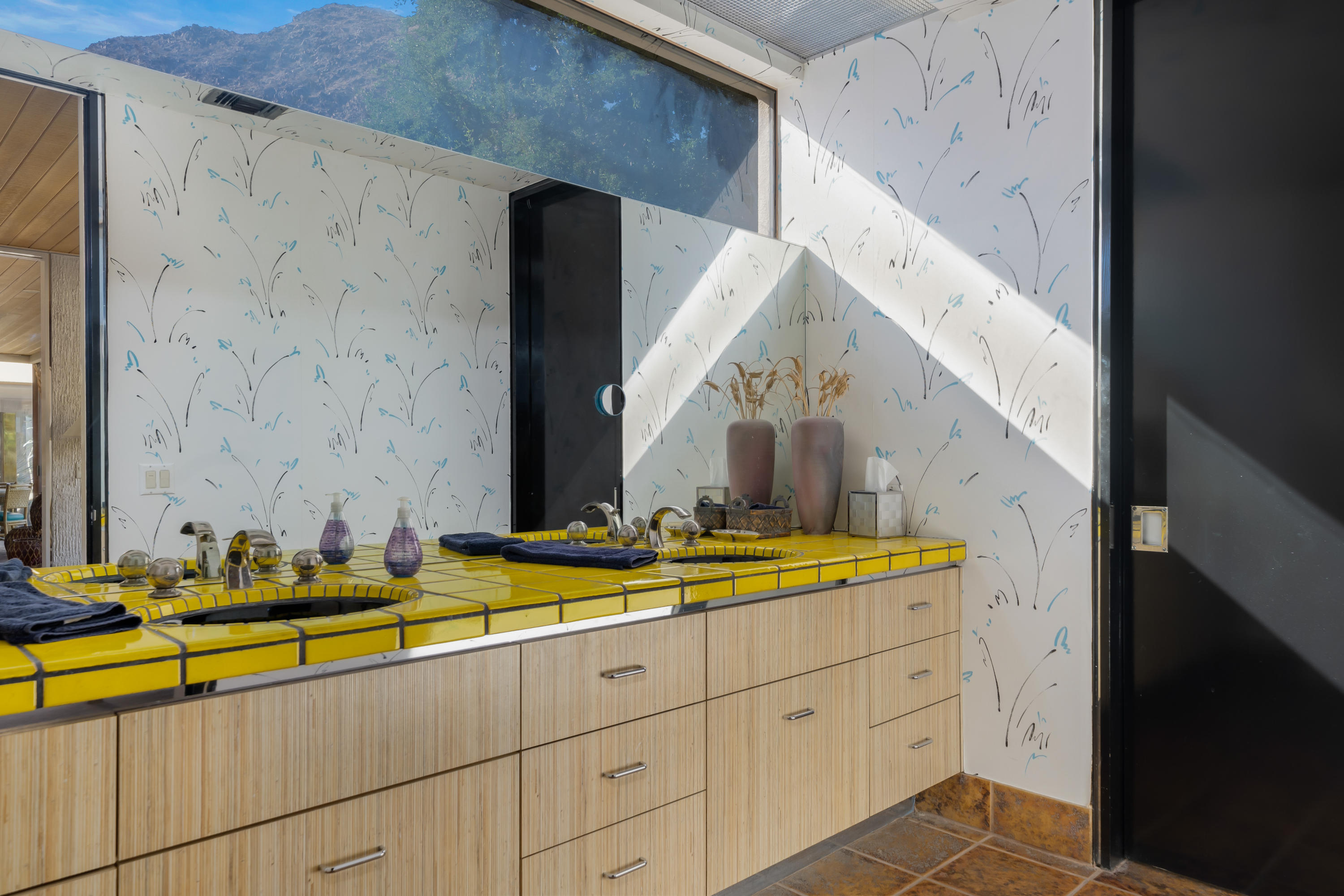 75270 Hidden Cove Indian Wells, CA 92210 - Photo 40 of 73 a bathroom with a double vanity sink and a mirror