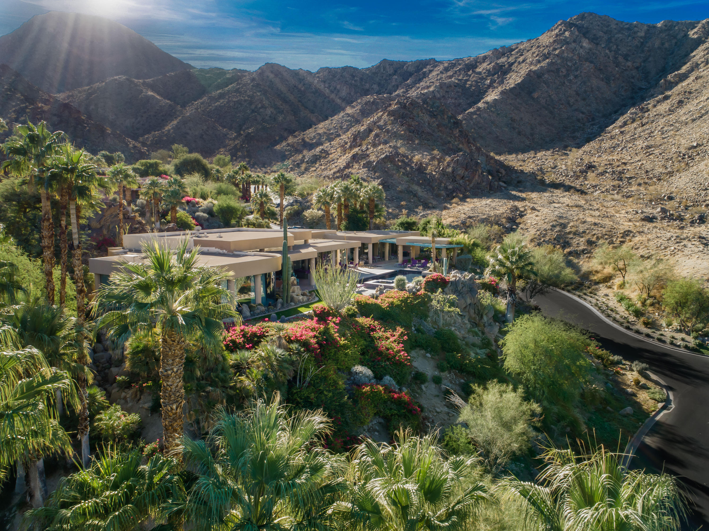 75270 Hidden Cove Indian Wells, CA 92210 - Photo 49 of 73 a view of a swimming pool with a yard