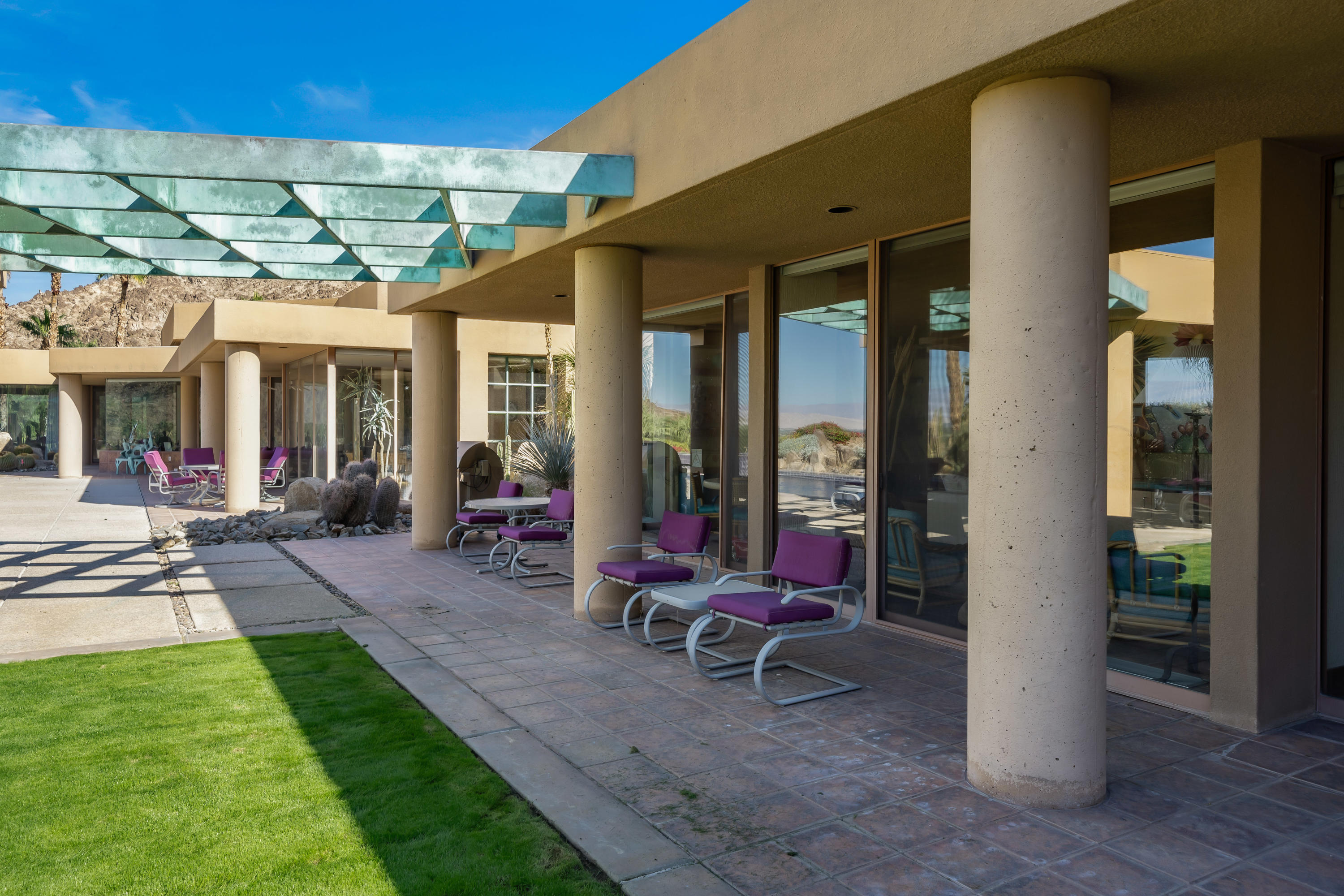 75270 Hidden Cove Indian Wells, CA 92210 - Photo 69 of 73 a view of a house with backyard porch and sitting area