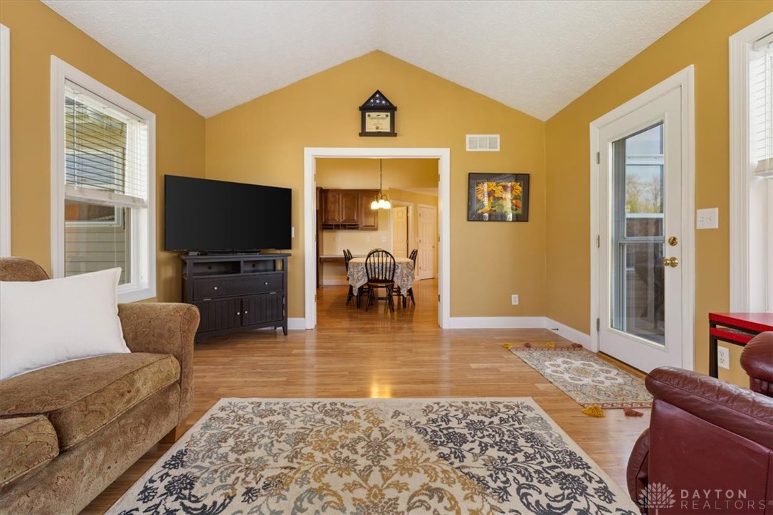 841 Willow Road Springfield, OH 45502 - Photo 13 of 64 This inviting living area boasts rich hardwood flooring and an elegant vaulted ceiling.