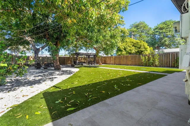 a view of a backyard with a garden