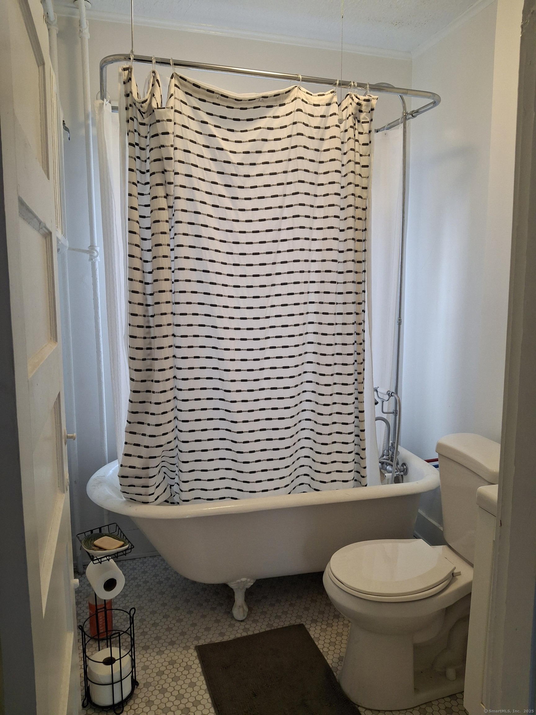 591 Wilmot Avenue, Unit 3 Bridgeport, CT 06607 - Photo 14 of 16 a bathroom with a sink toilet and shower