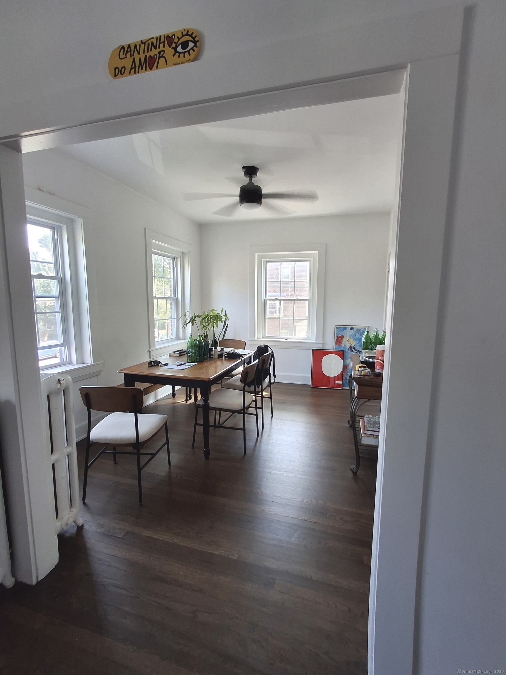 591 Wilmot Avenue, Unit 3 Bridgeport, CT 06607 - Photo 4 of 16 a view of a dining room with furniture and a window
