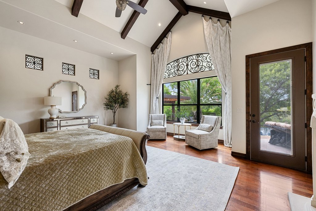1540 County Road 262 Georgetown, TX 78633 - Photo 12 of 40 The room is framed by bay windows that draw the Hill Country light deep into the room.