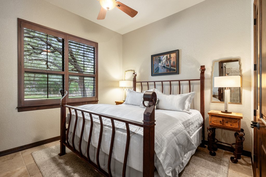 1540 County Road 262 Georgetown, TX 78633 - Photo 15 of 40 A second guest bedroom with its own ensuite bath on the main level rounds out an exceptionally livable single-floor footprint.