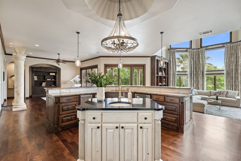 1540 County Road 262 Georgetown, TX 78633 - Photo 6 of 40 The gourmet kitchen seamlessly connects to indoor and outdoor living spaces.