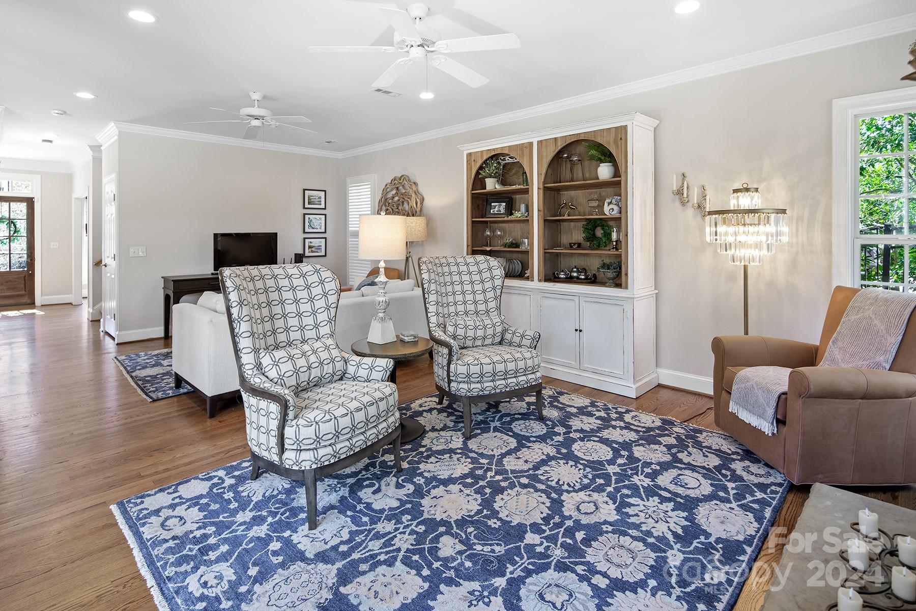 544 Ashby Drive Davidson, NC 28036 - Photo 18 of 40 a living room with furniture and wooden floor