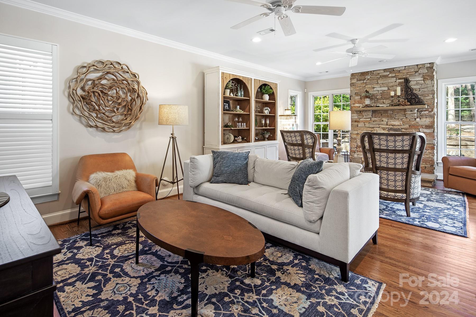 544 Ashby Drive Davidson, NC 28036 - Photo 21 of 40 a living room with furniture fireplace and window