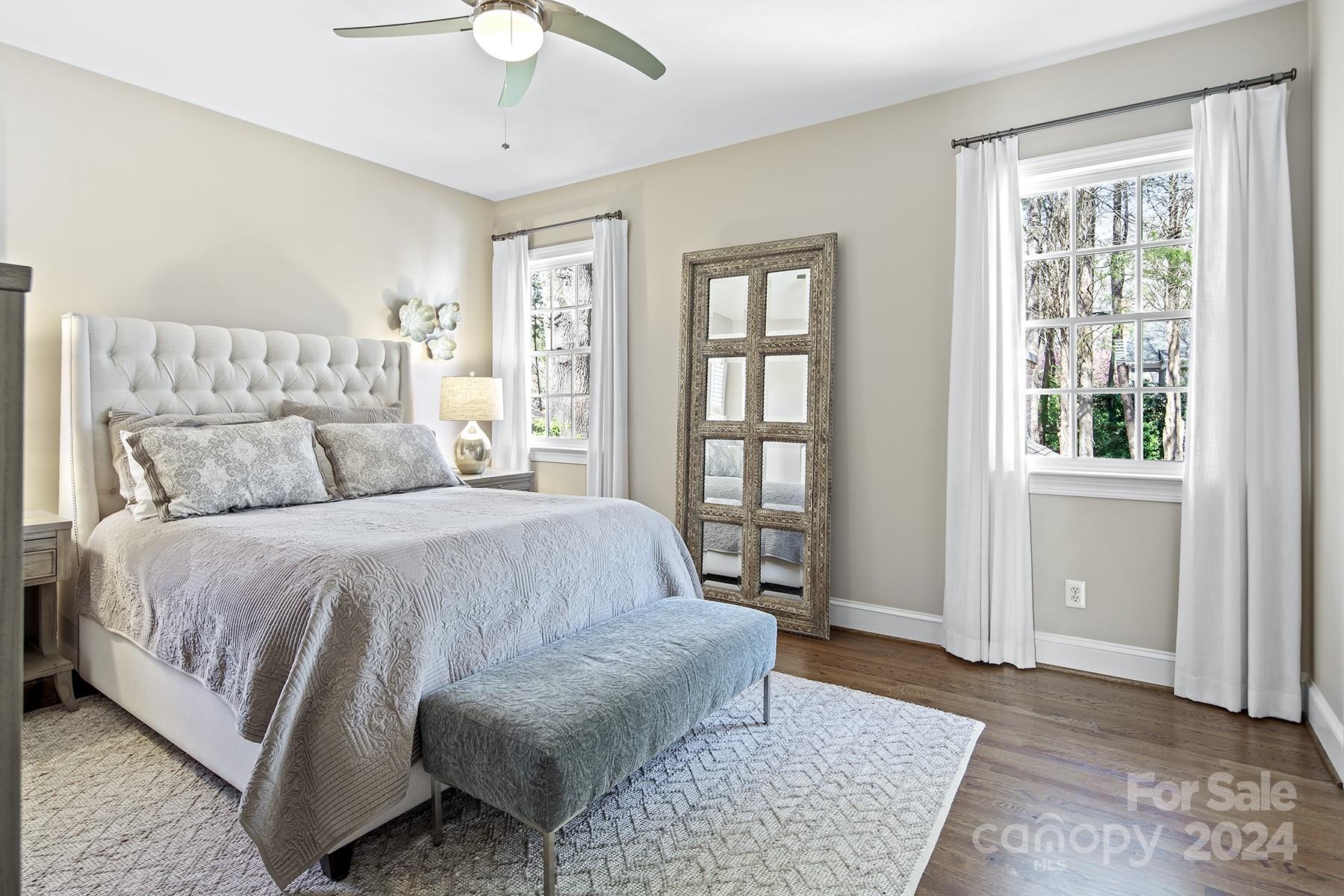 544 Ashby Drive Davidson, NC 28036 - Photo 22 of 40 a bedroom with a bed rug and window
