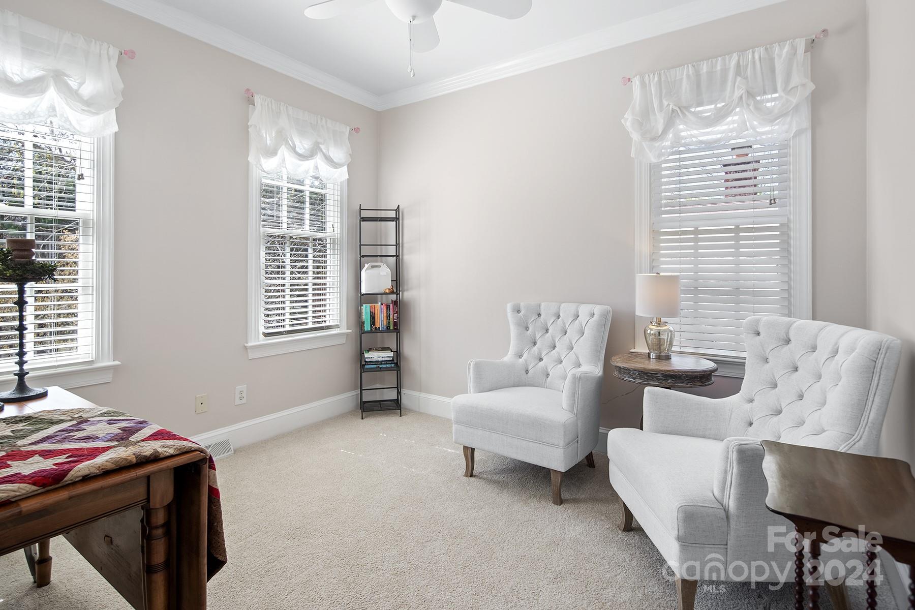 544 Ashby Drive Davidson, NC 28036 - Photo 24 of 40 a bedroom with furniture and a window