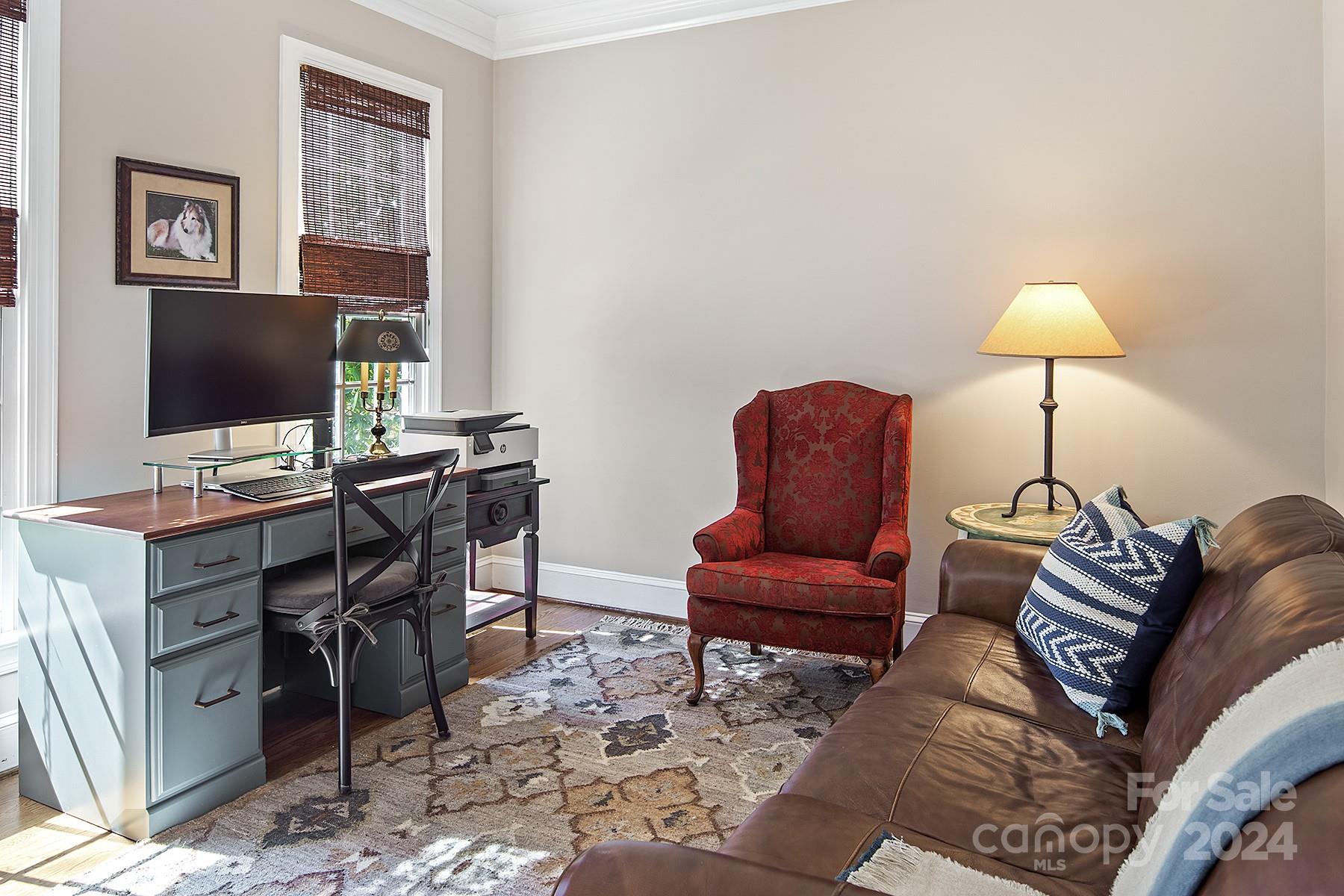 544 Ashby Drive Davidson, NC 28036 - Photo 27 of 40 a workspace with furniture and lamp