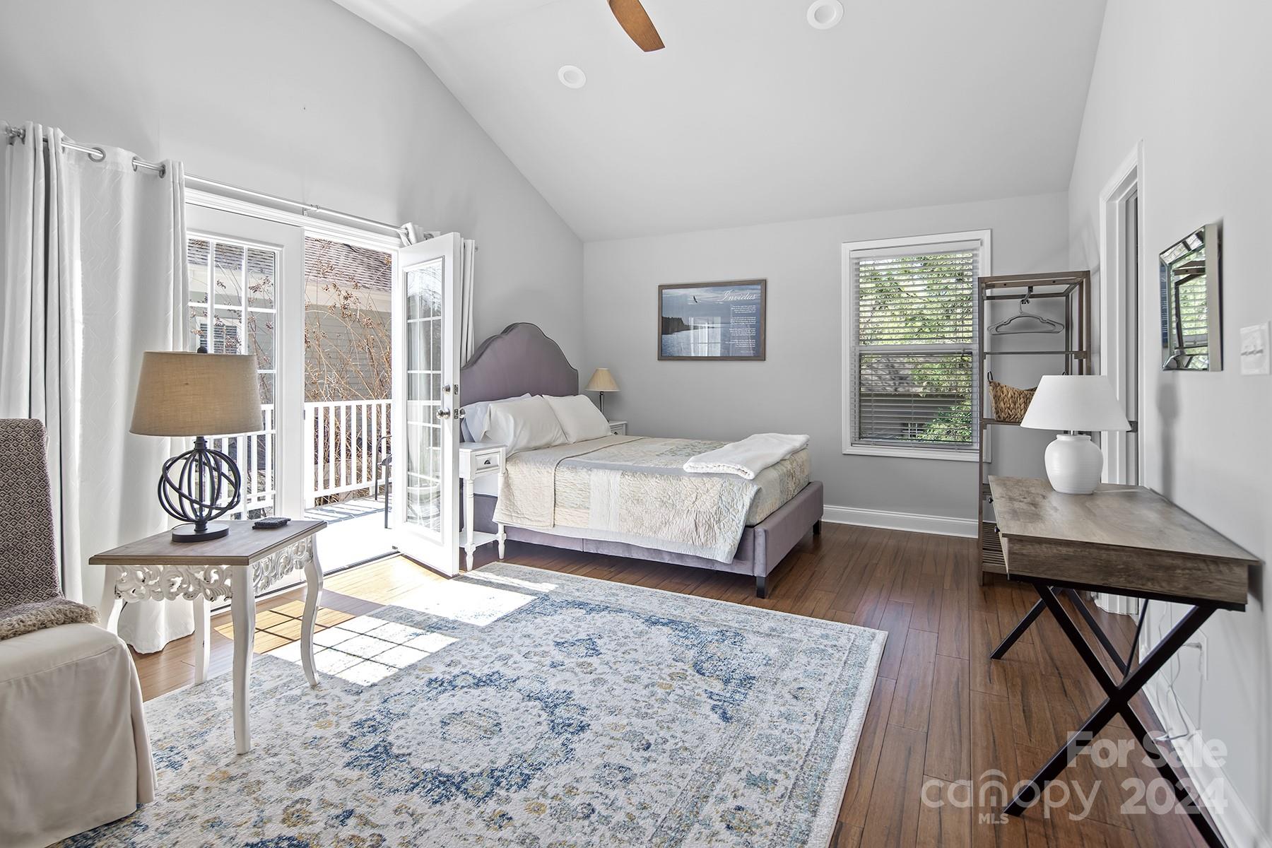 544 Ashby Drive Davidson, NC 28036 - Photo 29 of 40 a bedroom with a bed a table and chair