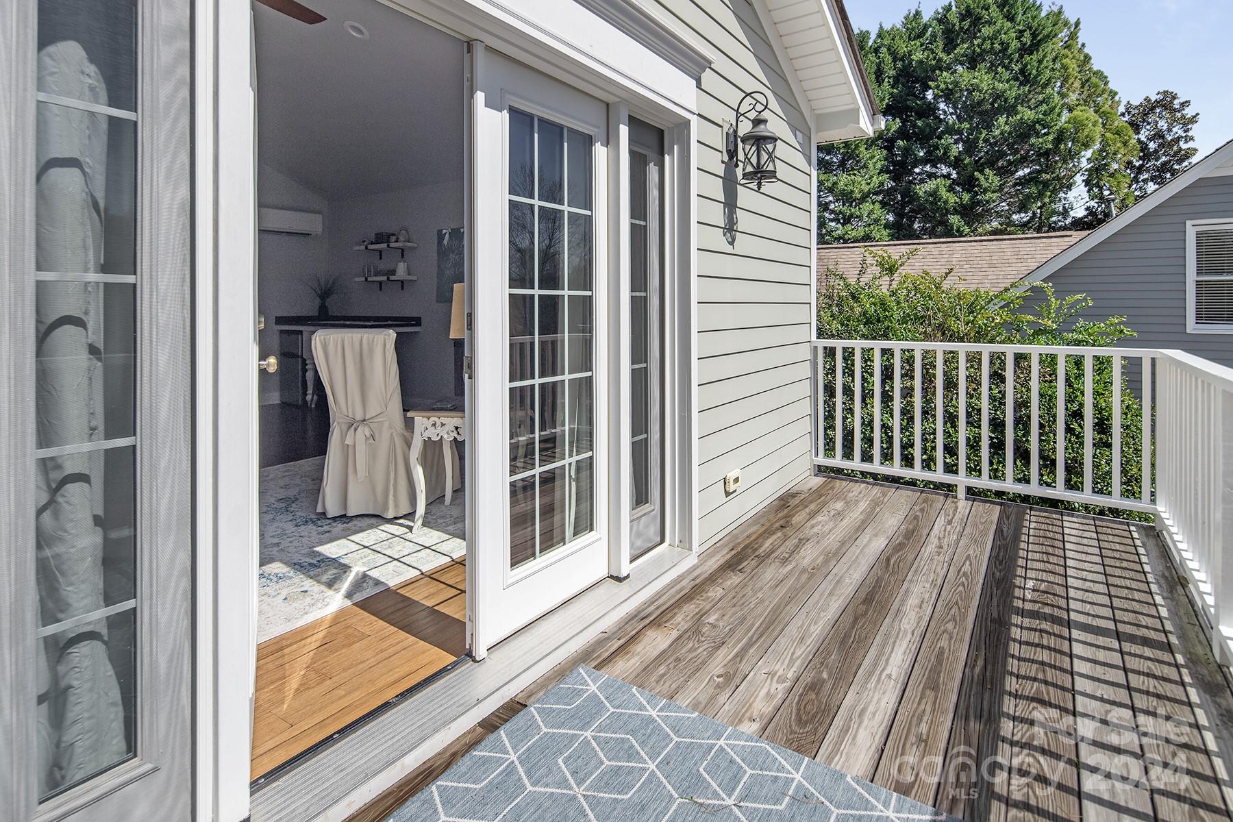 544 Ashby Drive Davidson, NC 28036 - Photo 30 of 40 a view of a balcony with wooden floor