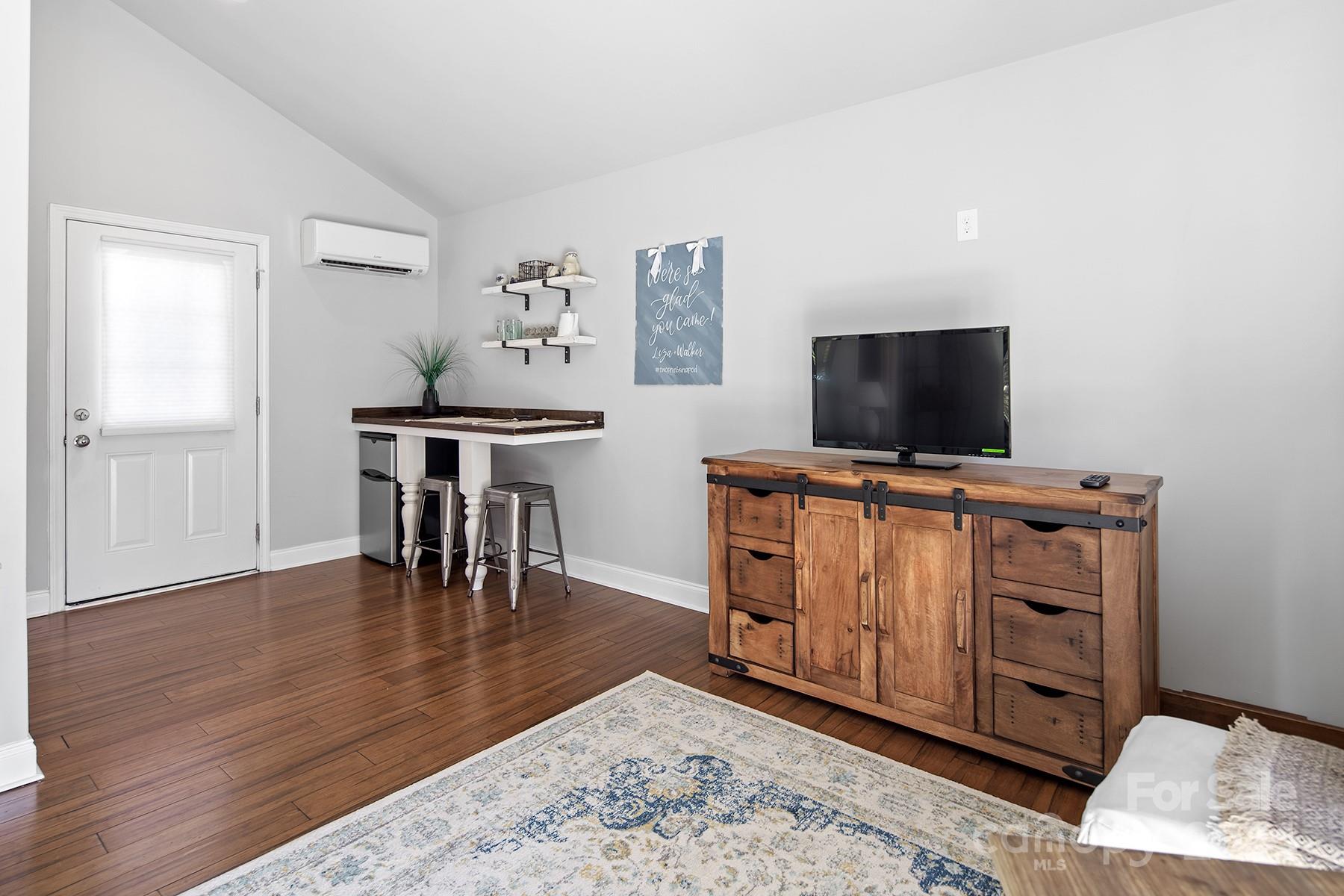 544 Ashby Drive Davidson, NC 28036 - Photo 31 of 40 a view of a workspace with furniture and wooden floor