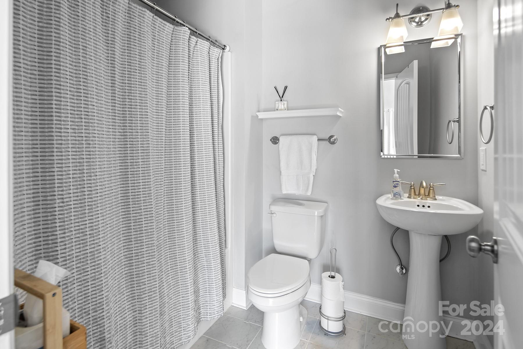 544 Ashby Drive Davidson, NC 28036 - Photo 33 of 40 a bathroom with a sink toilet and shower