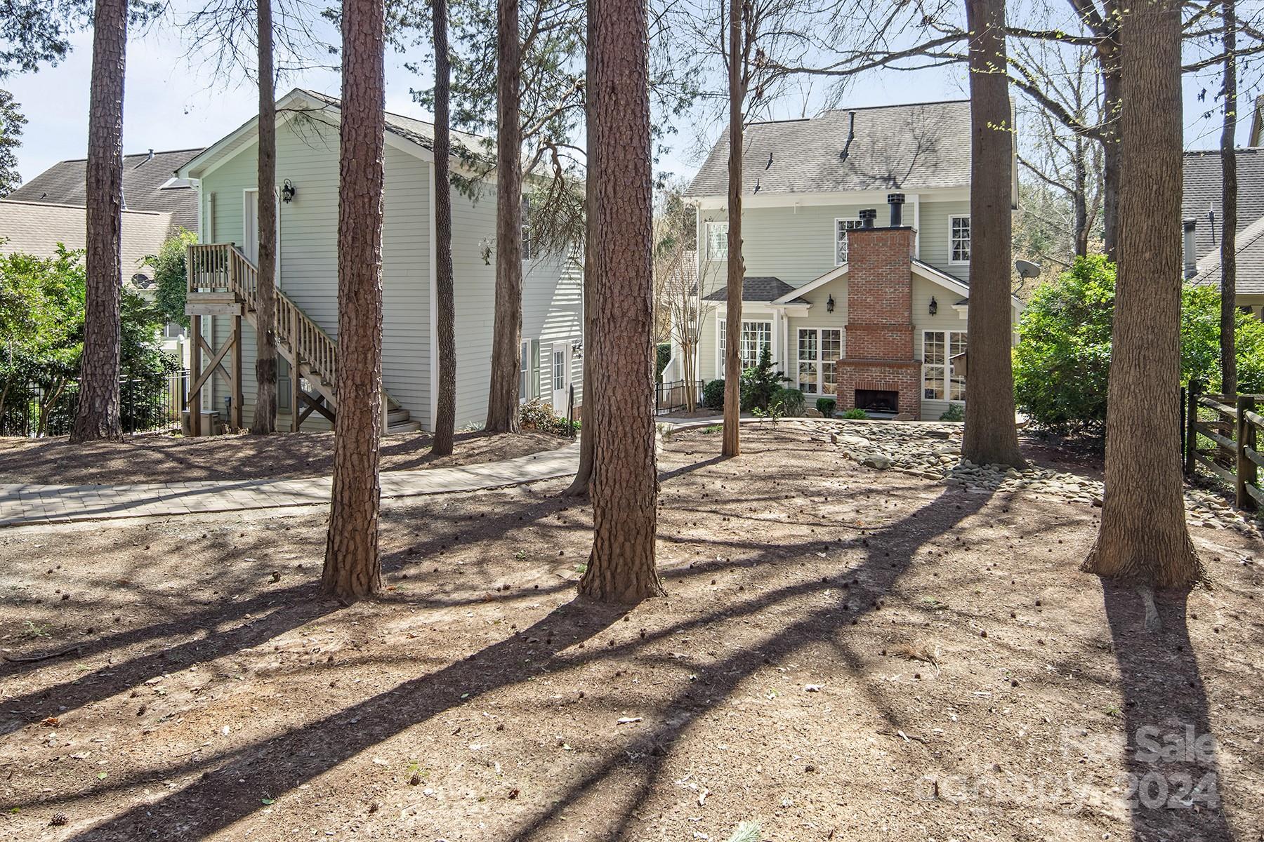 544 Ashby Drive Davidson, NC 28036 - Photo 35 of 40 a view of a city with large tree