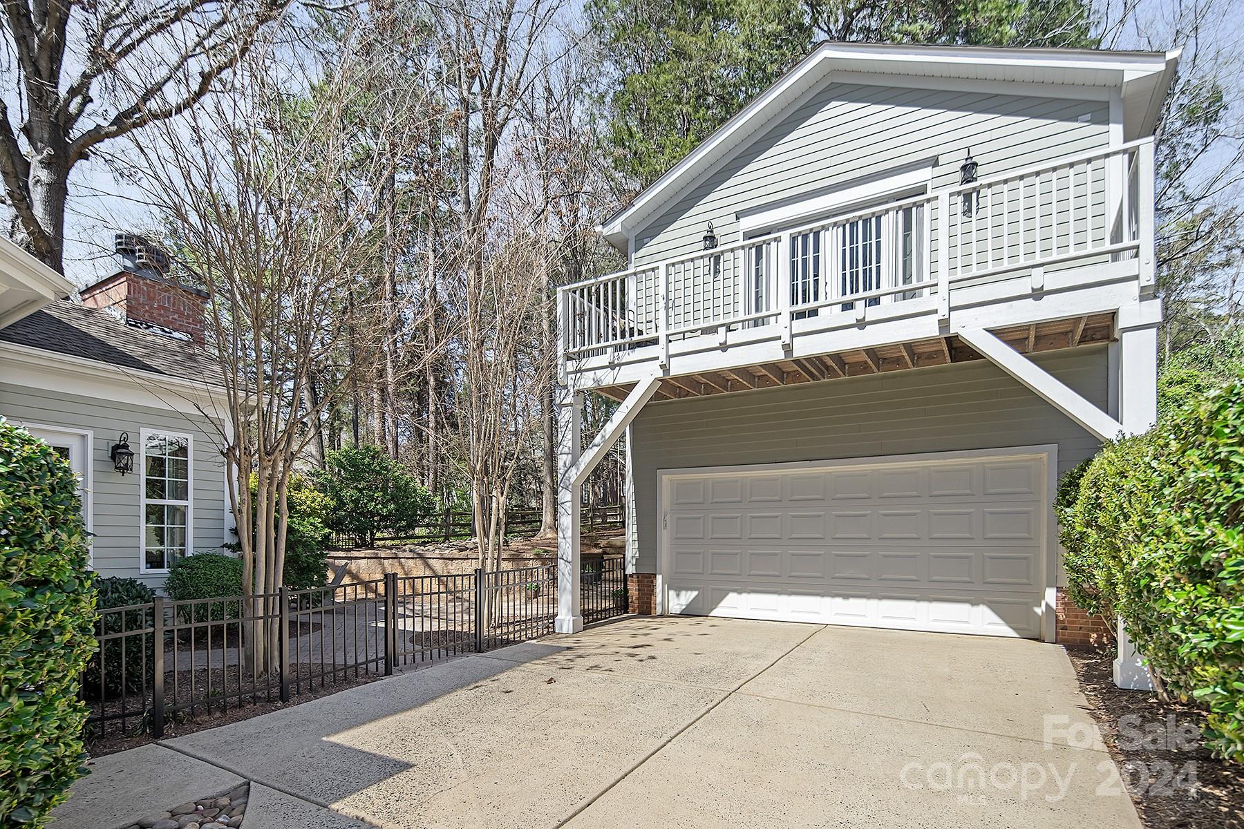 544 Ashby Drive Davidson, NC 28036 - Photo 39 of 40 a front view of a house with a garage