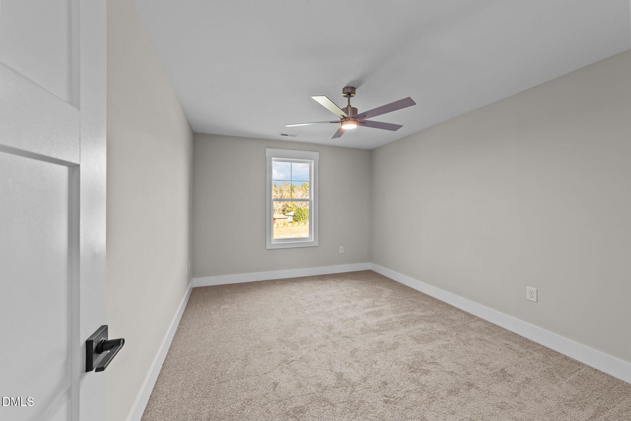 2568 Lassiter Road Four Oaks, NC 27524 - Photo 29 of 50 an empty room with a window