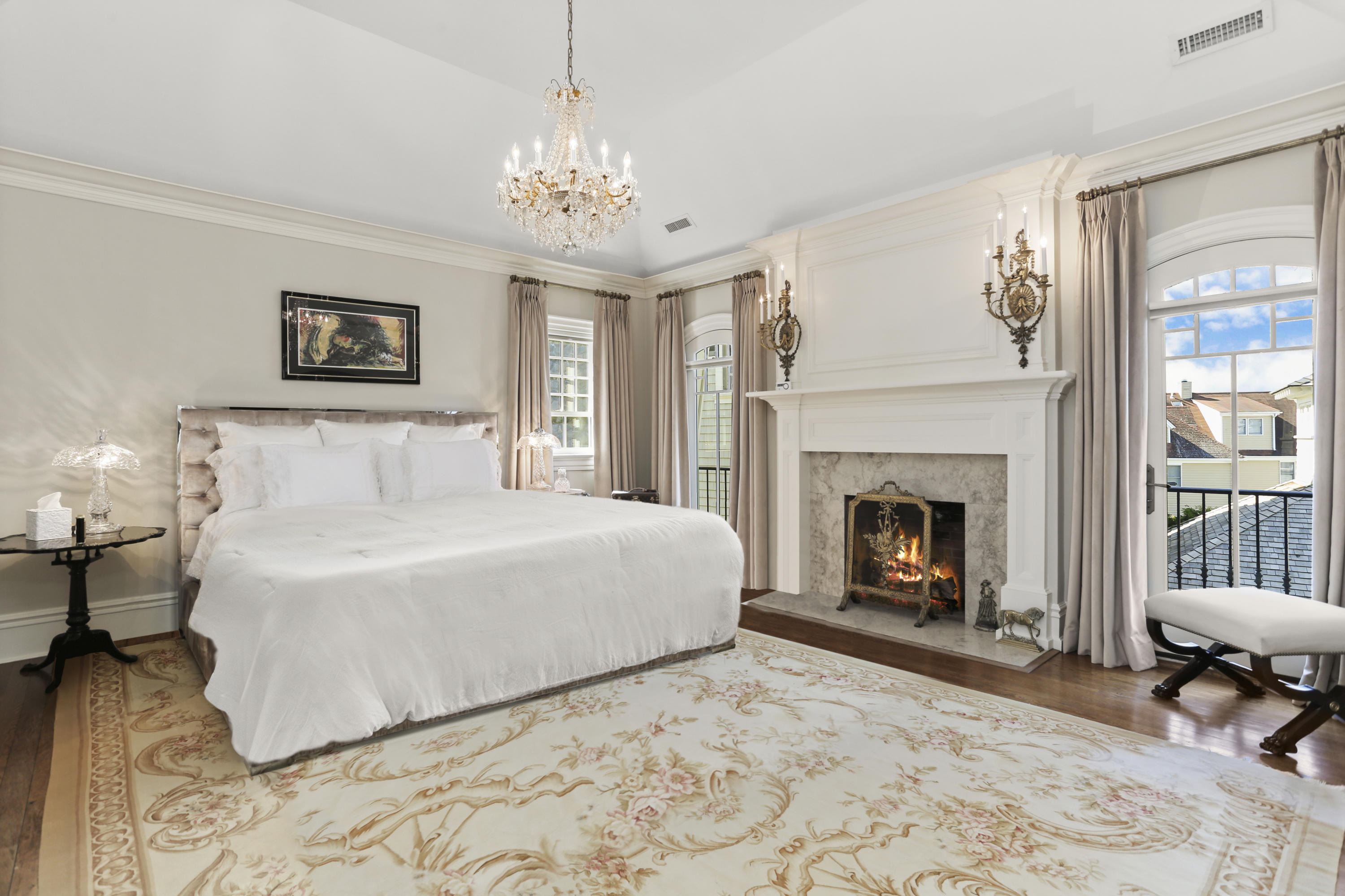50 Sound View Drive, Unit 2 SOUTH Greenwich, CT 06830 - Photo 8 of 21 a spacious bedroom with a bed and a fireplace