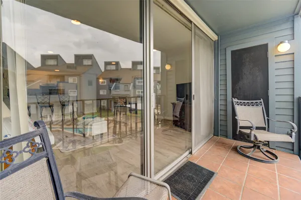 a room with glass door and glass door