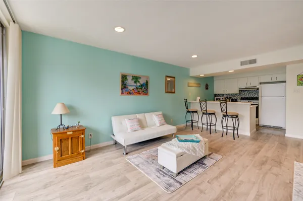 a living room with furniture and a table