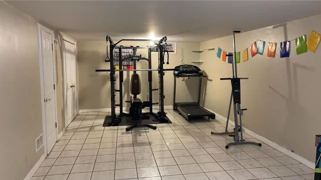 a view of a room with gym equipment