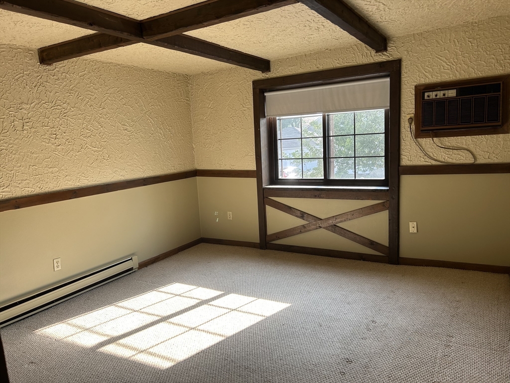 75 Winthrop Street, Unit 334 Everett, MA 02149 - Photo 4 of 8 a view of an empty room with a window
