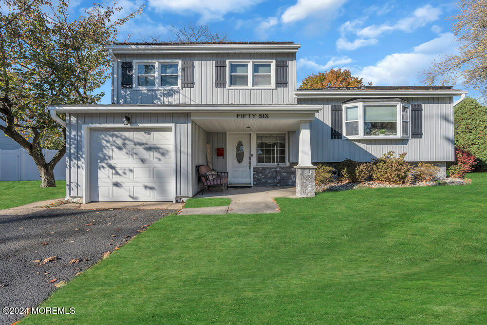 56 Bethany Road Holmdel, NJ 07733 - Photo 1 of 19 a view of house with yard and entertaining space