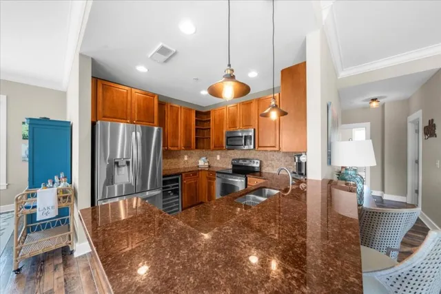 a view of hallway with wooden floor