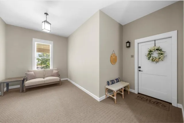 a front view of a house with a balcony