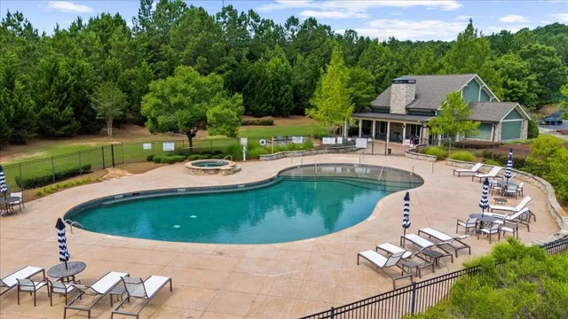 an aerial view of multiple houses with yard
